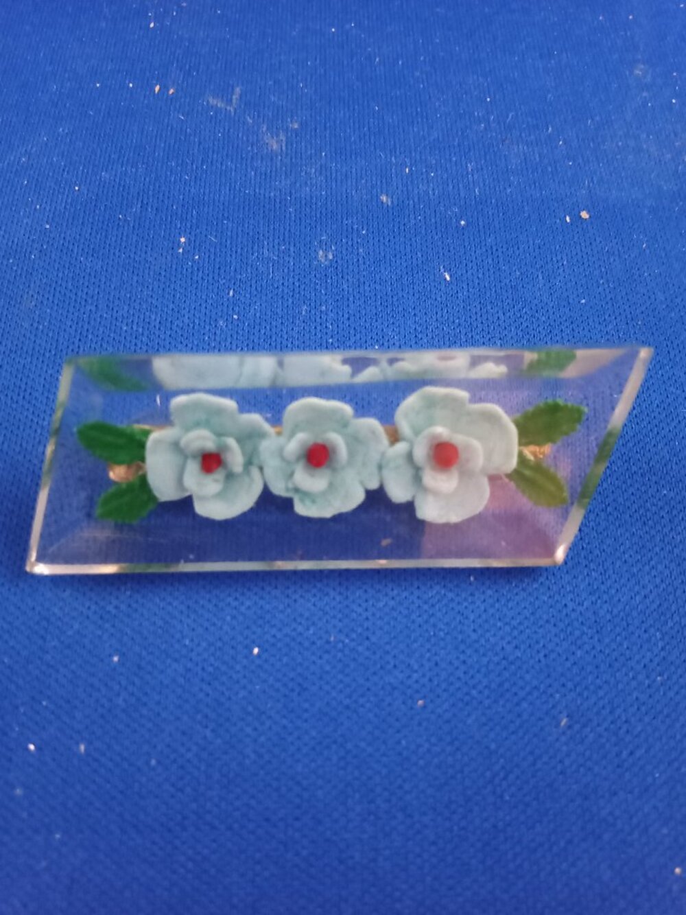 Vintage mid century lucite rectangle pin with blue flowers
